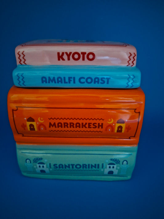 Brûleur pile de livres de voyage