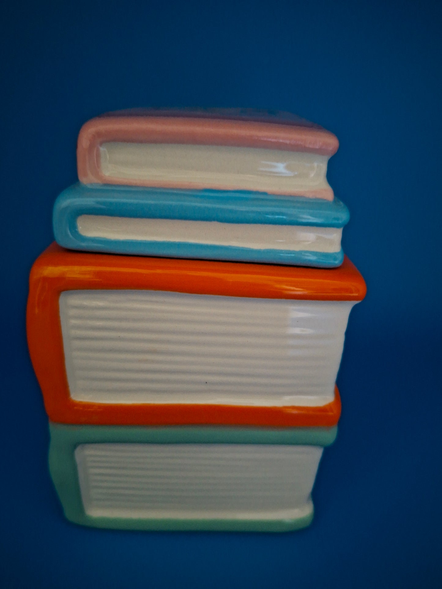 Brûleur pile de livres de voyage
